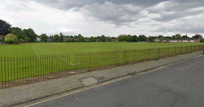 Woman arrested after boy, 13, attacked by 'out of control' dogs on Salford field