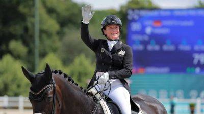 Equestrian-'Dressage queen' Werth sets medal record as German team wins gold