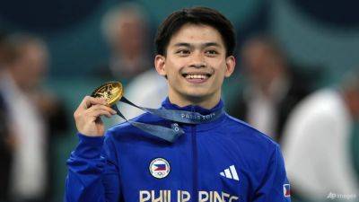 'Overwhelmed' Yulo wins historic gymnastics Olympic gold for Philippines