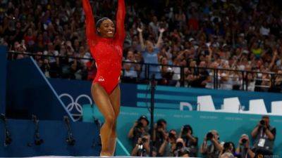 Gymnastics-Biles soars to third gold medal of Paris Olympics with vault triumph