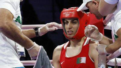 Algeria's Khelif beats Hungarian Hamori to ensure medal amid gender row