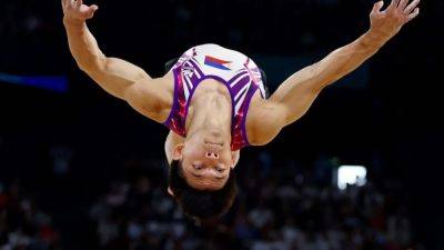 Gymnastics-Yulo wins historic gold for Philippines with floor exercise title