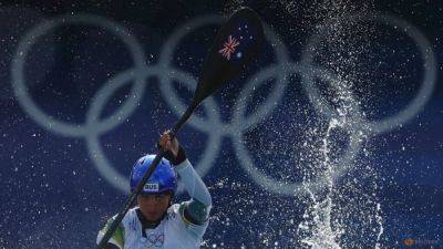 Canoeing-Fox survives first kayak cross hurdle in hunt for third gold