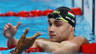 Milak roars home for men's 100 metres butterfly gold