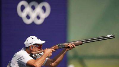 Shooting-Palestinian skeet shooter juggles anguish and pride appearing in Paris