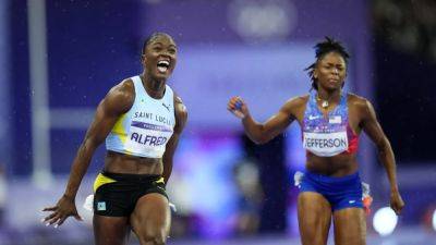 St. Lucia's Julien Alfred wins Olympic women's 100m gold, a first for the country