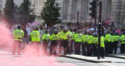 UK protests LIVE: Police officers injured, shops looted as violent disorder breaks out in major cities