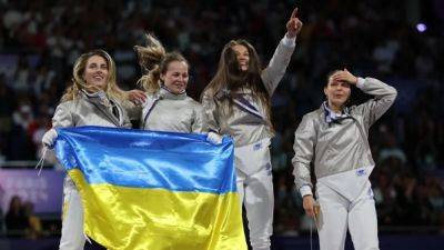 Paris Games - Fencing-Ukraine win first gold in Paris with women's sabre team event - channelnewsasia.com - Russia - France - Ukraine - Japan - South Korea