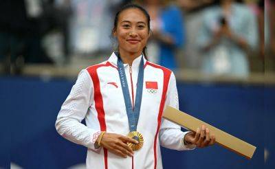 Chinese Tennis Star Zheng Qinwen Makes History With Olympic Singles Gold