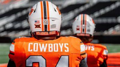 Oklahoma State barred from placing NIL-linked QR codes on helmets - ESPN - espn.com - Chad - state Oklahoma - state South Dakota