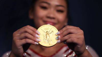 How many Olympic gold medals does Suni Lee have? Top titles - ESPN