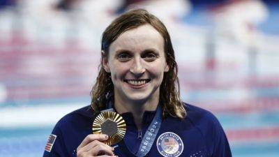 Ledecky takes record ninth gold as Summer sparkles