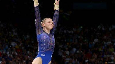 Gymnastics-Carey savours vault redemption at Paris Games