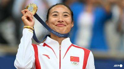 Zheng Qinwen makes history with Olympic tennis singles gold
