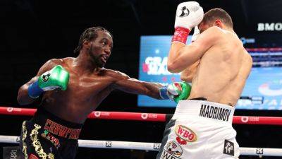 Terence Crawford - Terence Crawford ekes out decision to take Israil Madrimov's title - ESPN - espn.com - Los Angeles - county Crawford - state Nebraska