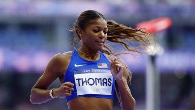 Paris Olympics - Gabby Thomas - Shericka Jackson - Julien Alfred - Thomas of US begins assault on Olympic 200m with fastest preliminary run - channelnewsasia.com - Britain - Usa - Hungary - Nigeria - Jamaica