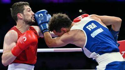 Lennox Lewis - Nova Scotia - Canada's Wyatt Sanford claims Olympic bronze after losing boxing semifinal by split decision - cbc.ca - France - Usa - Canada