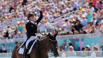 Equestrian-Germany's von Bredow-Werndl wins dressage gold in Tokyo repeat