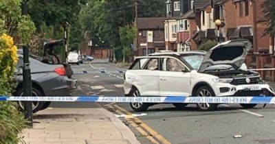 Scene of chaos as car lands on side after four-car crash