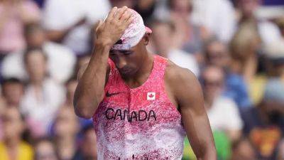 2020 Olympic champ Warner says withdrawing from decathlon was a 'worst nightmare'