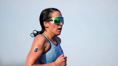 Triathlon-Belgium out of relay after athlete falls ill