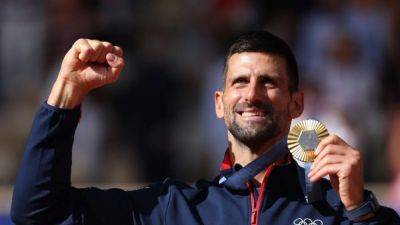 Djokovic fights off Alcaraz to finally strike gold