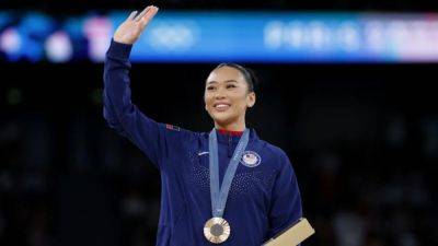 Gymnastics-Defying odds, Lee adds to her medal haul in Paris
