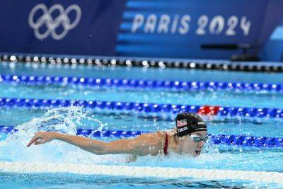 Swimming: US win Olympic women’s 4x100m medley gold with world record