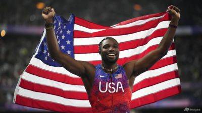 Fred Kerley - Noah Lyles - Showman Noah Lyles wins 100m gold by five thousandths of a second - channelnewsasia.com - Italy - Usa - Botswana - South Africa - Jamaica