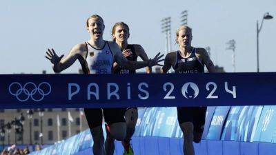 Triathlon-Germany win mixed relay gold, US and Britain have medals switched