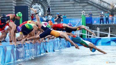 Seine triathlon swim may cause sickness, definitely caused stress - channelnewsasia.com - Britain - France - Germany - Belgium - Usa - Georgia