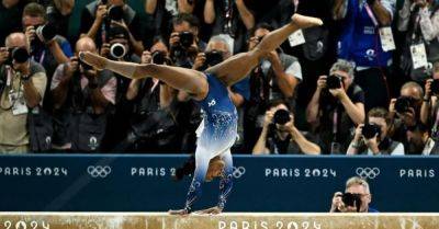 Shock slip-up for Simone Biles leaves her outside the medals on beam