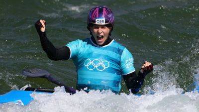 Canoeing-Britons overcome breakfast jitters to bring home kayak cross medals