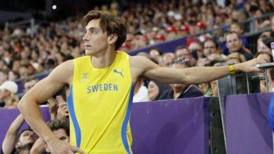 Peerless Duplantis caps golden night with pole vault world record