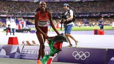 Kenya's Chebet wins women's 5,000m gold; compatriot Kipyegon DQ'd, reinstated to earn silver