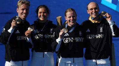 Alex Yee - German triathletes sprint to finish for Olympic mixed relay gold over U.S. - cbc.ca - Britain - France - Germany - Usa - Georgia - New Zealand