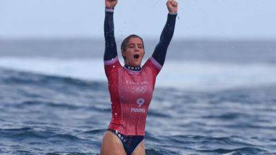 Surfing-Team USA's Marks wins gold in Tahiti