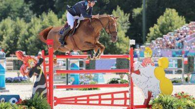 Equestrian-Sweden's Von Eckermann falls in showjumping final