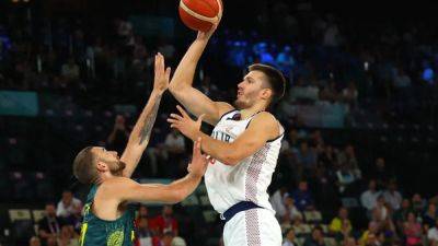 Jokic leads Serbia to overtime win over Australia and into last four