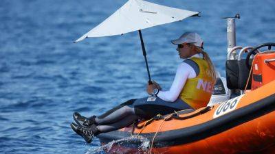 Sailing-Dinghy medal races pushed back to Wednesday with breeze in flux