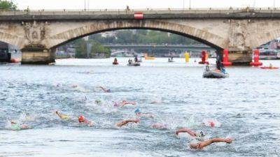 Olympic marathon swim test run cancelled over water quality concerns for Seine River