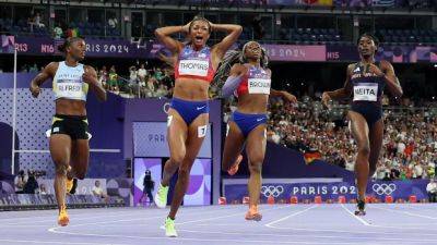 Dominant Thomas lands women's 200m Olympic title, denying Alfred a sprint double