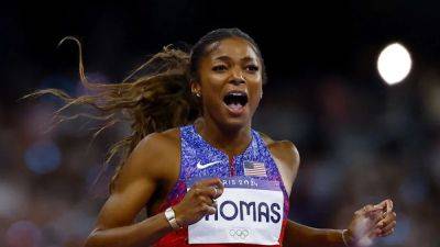 Gabby Thomas - Shericka Jackson - Dominant Thomas lands first 200m global title - channelnewsasia.com - Britain - Usa - county Thomas - Jamaica