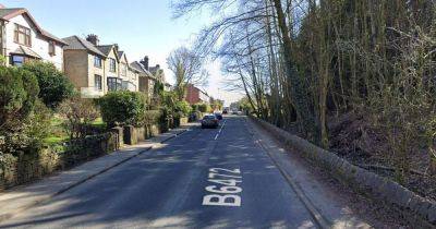 Two taken to hospital with road closed off after crash