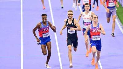 American Cole Hocker rallies late, stuns favourites to win men's 1,500m gold medal