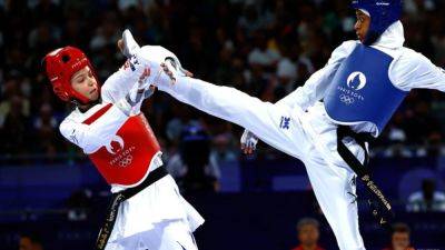 Taekwondo-Tearful Israeli Semberg ousted by Saudi Abutaleb in round of 16