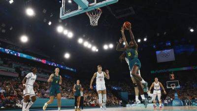 Australia earn revenge and spot in last four with Serbia win