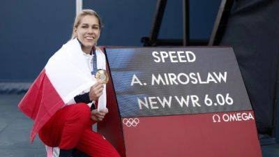 Climbing-Miroslaw mural needs updating after record-breaking Olympic win