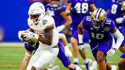 Texas RB CJ Baxter to undergo season-ending knee surgery - ESPN