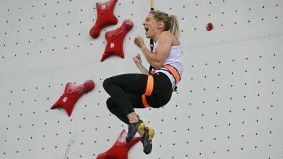 Polish speed climber Aleksandra Miroslaw breaks her world record twice en route to gold